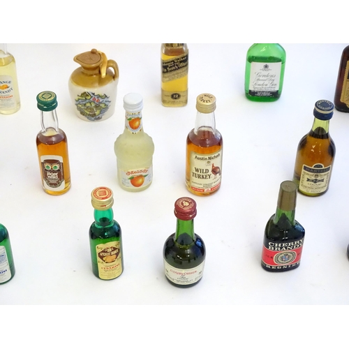 1460 - A quantity of miniature spirit bottles to include Glenfiddich special reserve malt whisky, Drambuie,... 