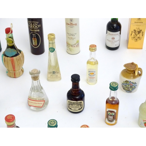 1460 - A quantity of miniature spirit bottles to include Glenfiddich special reserve malt whisky, Drambuie,... 