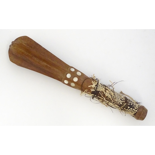 1472 - Ethnographic / Native / Tribal: A tribal wooden mace / club with flanged head, mother of pearl round... 