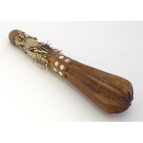 1472 - Ethnographic / Native / Tribal: A tribal wooden mace / club with flanged head, mother of pearl round... 