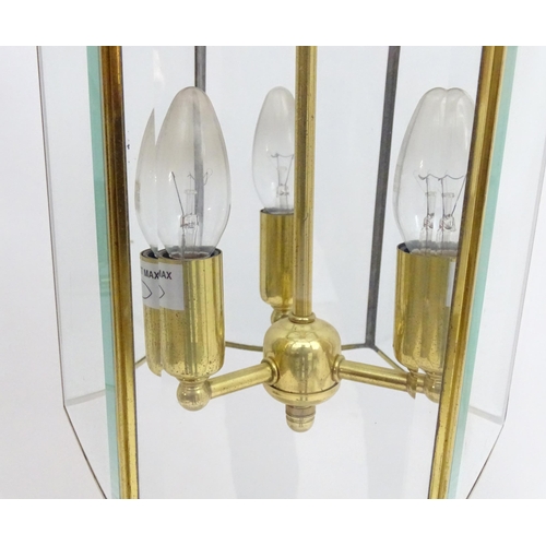 2241 - A set of 4 late 20thC pendant lights, the three branch lights hexagonal formed lantern shades with b... 