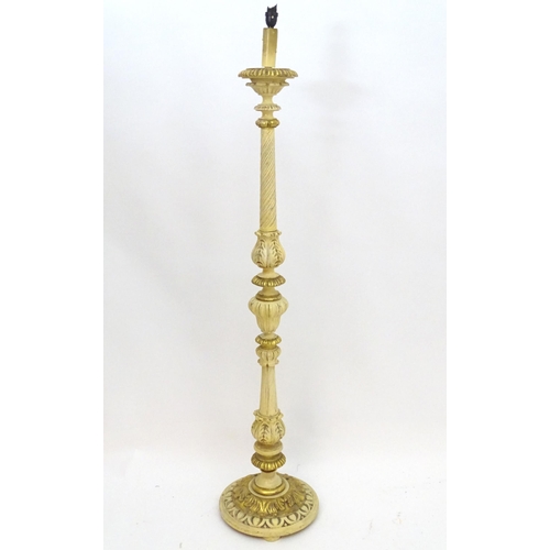 2244 - A mid - late 20thC Italian carved wood standard lamp with cream and gilt finish. Approx 65