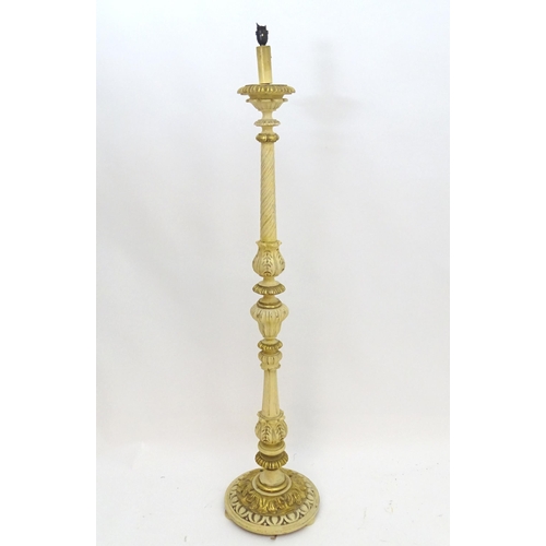 2244 - A mid - late 20thC Italian carved wood standard lamp with cream and gilt finish. Approx 65