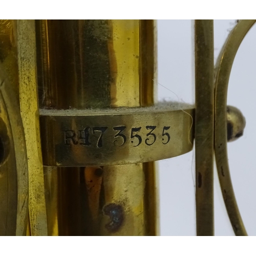 2261 - An 1891 Benham & Froud brass and copper tripod standard lamp in the manner of Dr C Dresser. bearing ... 