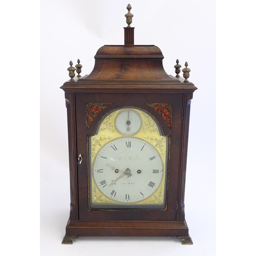 2282 - A mahogany cased bracket clock, the brass and enamel break arch dial signed ' Robt Wood , London ' a... 