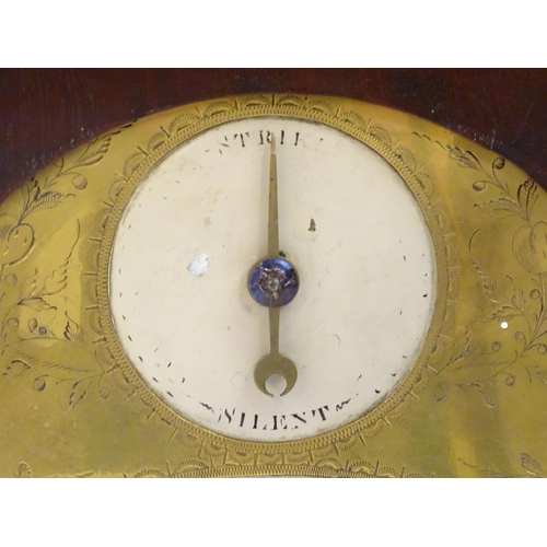 2282 - A mahogany cased bracket clock, the brass and enamel break arch dial signed ' Robt Wood , London ' a... 