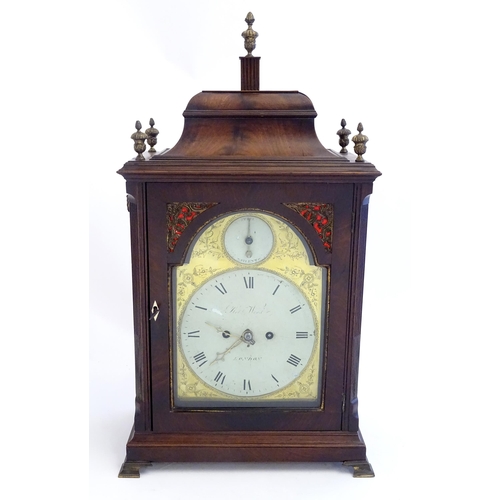 2282 - A mahogany cased bracket clock, the brass and enamel break arch dial signed ' Robt Wood , London ' a... 