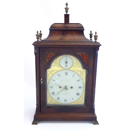 2282 - A mahogany cased bracket clock, the brass and enamel break arch dial signed ' Robt Wood , London ' a... 