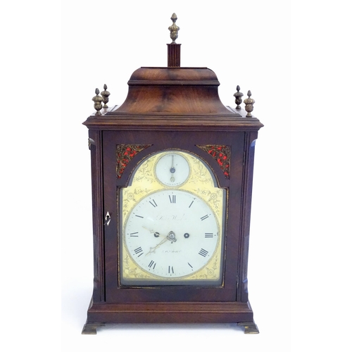 2282 - A mahogany cased bracket clock, the brass and enamel break arch dial signed ' Robt Wood , London ' a... 