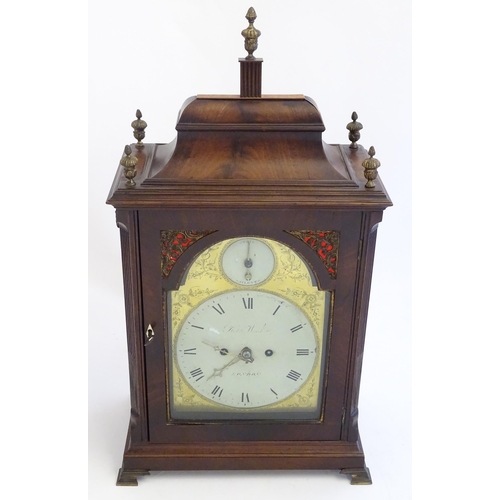 2282 - A mahogany cased bracket clock, the brass and enamel break arch dial signed ' Robt Wood , London ' a... 