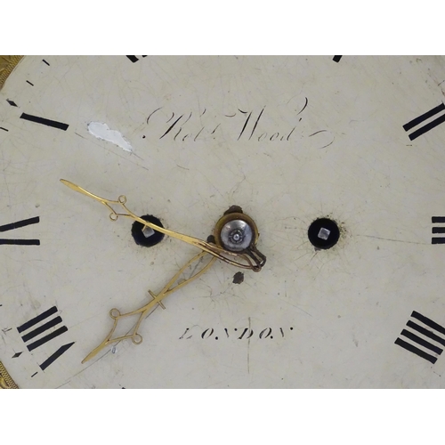 2282 - A mahogany cased bracket clock, the brass and enamel break arch dial signed ' Robt Wood , London ' a... 