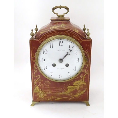 2283 - Maple & Co : A mantle clock with white enamel dial signed Maple & Co Ltd Paris London within a red l... 