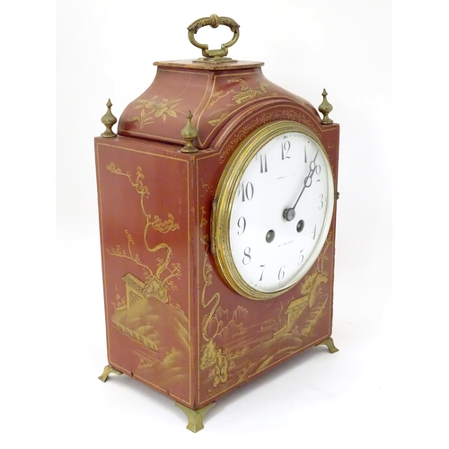 2283 - Maple & Co : A mantle clock with white enamel dial signed Maple & Co Ltd Paris London within a red l... 