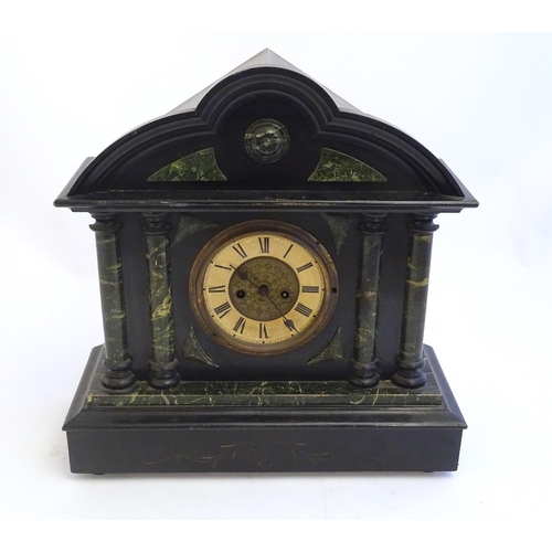 2284 - A mantle clock with wooden faux slate / marble case. The whole approx 17 1/2