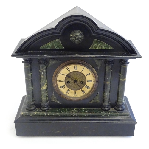 2284 - A mantle clock with wooden faux slate / marble case. The whole approx 17 1/2