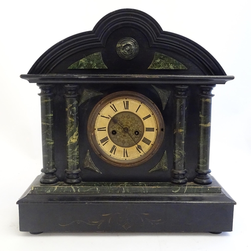 2284 - A mantle clock with wooden faux slate / marble case. The whole approx 17 1/2