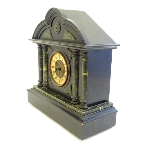 2284 - A mantle clock with wooden faux slate / marble case. The whole approx 17 1/2