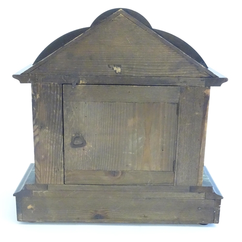 2284 - A mantle clock with wooden faux slate / marble case. The whole approx 17 1/2