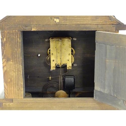 2284 - A mantle clock with wooden faux slate / marble case. The whole approx 17 1/2