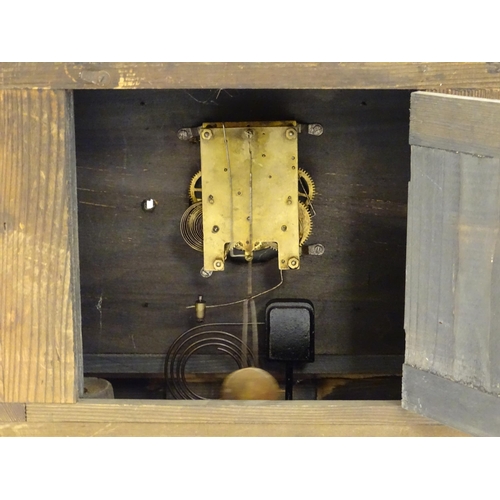 2284 - A mantle clock with wooden faux slate / marble case. The whole approx 17 1/2