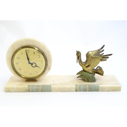 2287 - A 20thC late Art deco onyx mantle clock with stylised pelican decoration 17 3/4