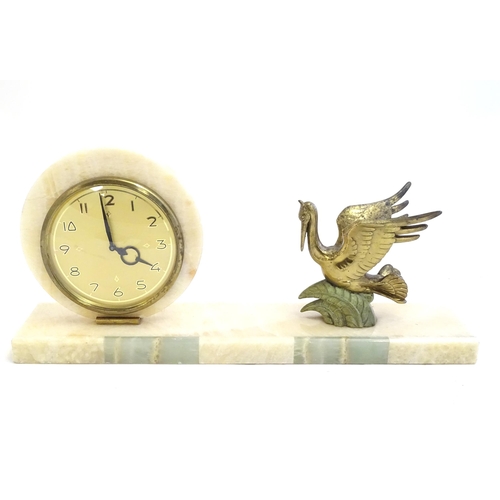 2287 - A 20thC late Art deco onyx mantle clock with stylised pelican decoration 17 3/4