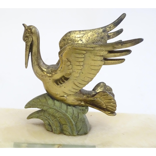 2287 - A 20thC late Art deco onyx mantle clock with stylised pelican decoration 17 3/4