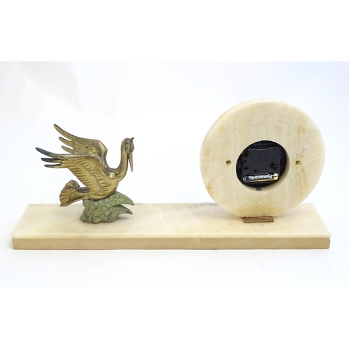 2287 - A 20thC late Art deco onyx mantle clock with stylised pelican decoration 17 3/4