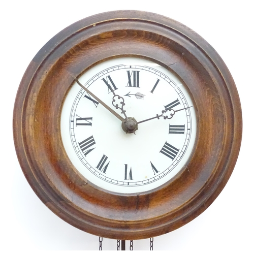 2287A - A postmans alarm style wall clock  with cast black forest style pine cone weights. The movement surm... 