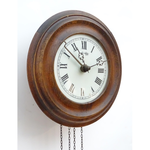 2287A - A postmans alarm style wall clock  with cast black forest style pine cone weights. The movement surm... 