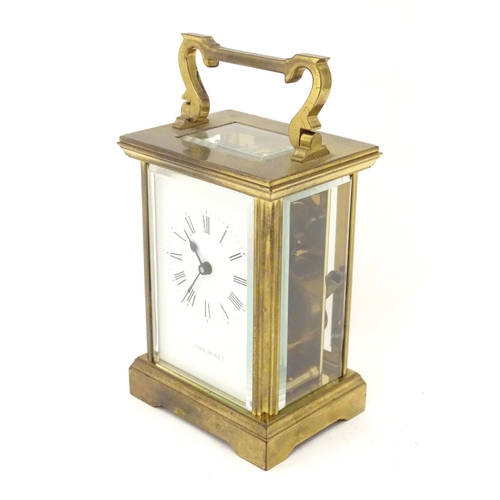 2290 - A brass five glass carriage clock, the white enamel dial  with Roman numerals and inscribed 'Jean Re... 