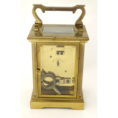 2290 - A brass five glass carriage clock, the white enamel dial  with Roman numerals and inscribed 'Jean Re... 