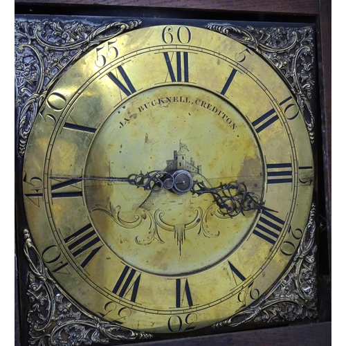 2292 - James Bucknell, Crediton, Devon : An 18thC oak cased longcase clock with 30 hour movement and brass ... 