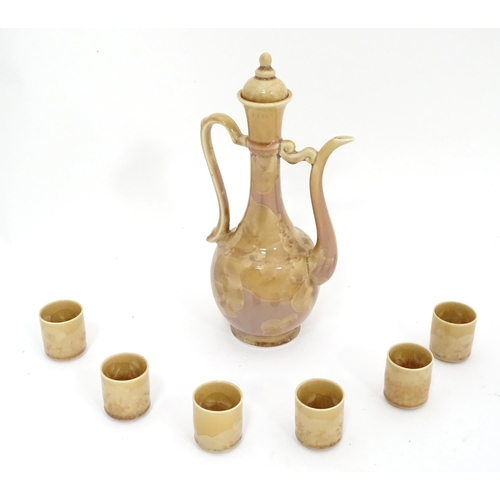 43 - An Oriental coffee set comprising hot water pot and coffee cups / cans. Character marks under.