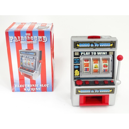51 - Novelty Electronic slot machine (boxed)