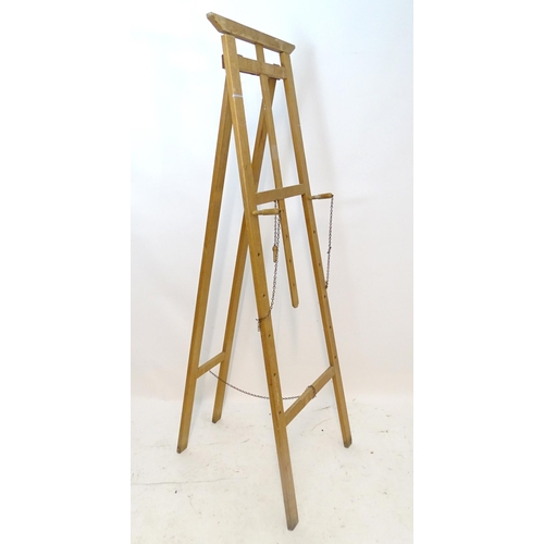 1108 - A 20thC artist's easel. Approx. 73 3/4