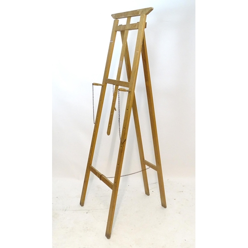 1108 - A 20thC artist's easel. Approx. 73 3/4