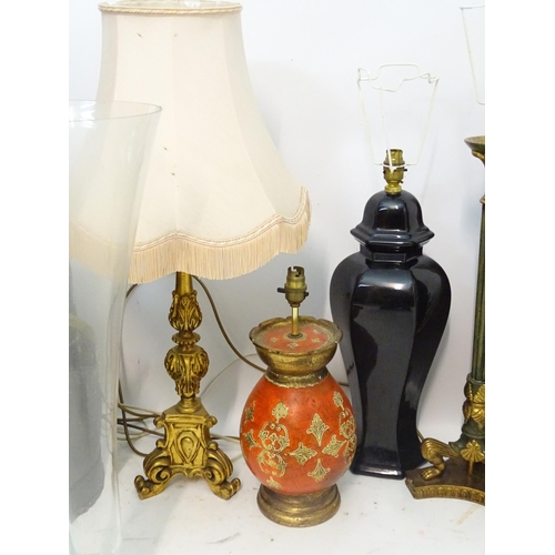 1110 - Assorted items to include table lamps, coal scuttles, a glass vase and a painted jardiniere