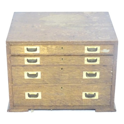 1111 - A Walker & Hall, Sheffield oak cutlery/ flatware box / canteen with four drawers and campaign style ... 