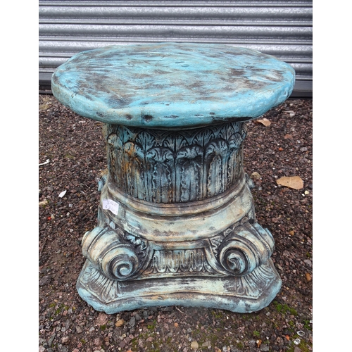 1118 - A reconstituted stone painted garden plant stand formed as an Iconic column capital. Approx. 15 1/2