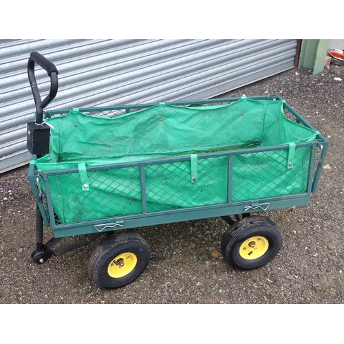 1119 - A garden barrow with four wheels, steering handle and collapsible sides. Approx. 41 1/2