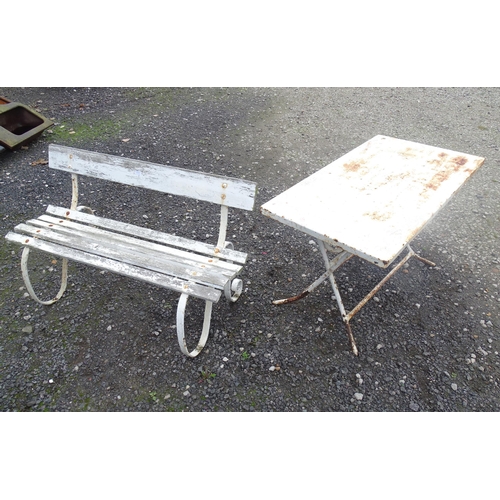 1121 - A Victorian garden bench with wrought iron mounts and wooden slatted seat, white painted finish, tog... 