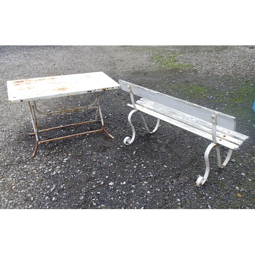 1121 - A Victorian garden bench with wrought iron mounts and wooden slatted seat, white painted finish, tog... 