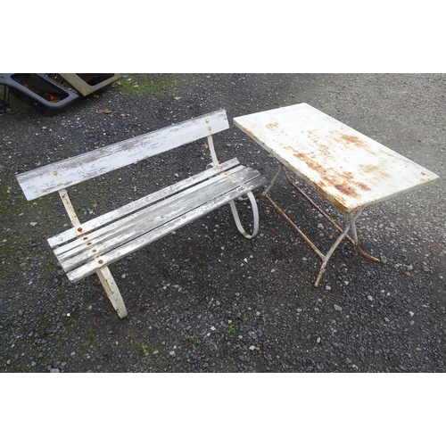 1121 - A Victorian garden bench with wrought iron mounts and wooden slatted seat, white painted finish, tog... 