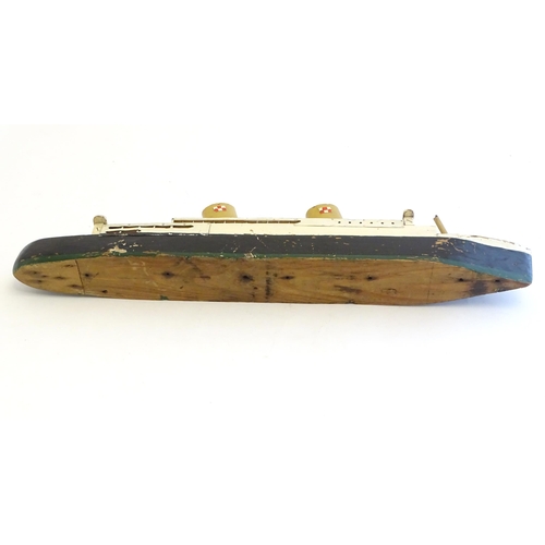 1308 - Toys: An early 20thC scratch built steam ship / boat with two funnels and green hull, possibly model... 