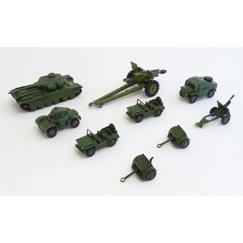 1309 - Toys: A quantity of Dinky Toys military vehicles comprising Armoured Car, model no. 670; Austin Cham... 