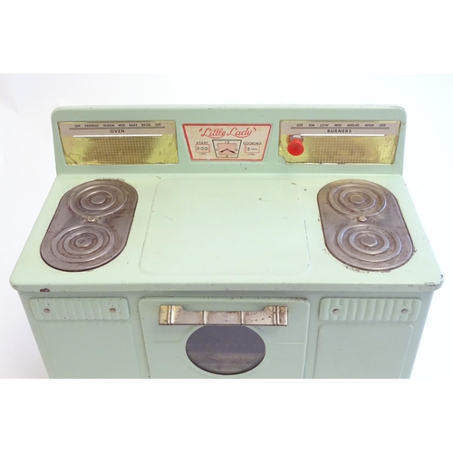 1322 - Toys: An American child's tinplate retro ' Little Lady ' cooker / stove, by Empire, with an opening ... 