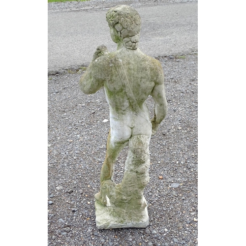 1371 - Garden & Architectural, Salvage: a 20thC reconstituted stone statue formed as Michaelangelo's David,... 