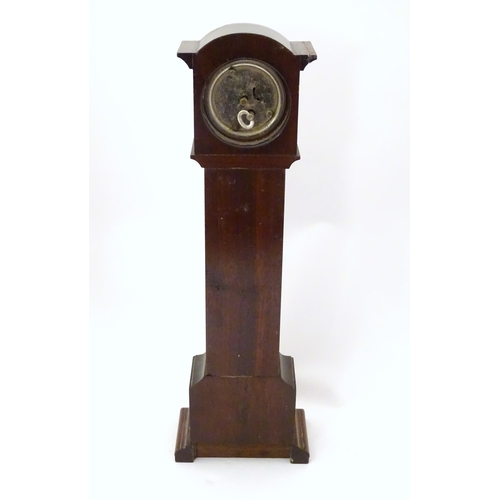 1396 - A mantle clock formed as a miniature long case / grandfather clock. Approx. 16 1/2