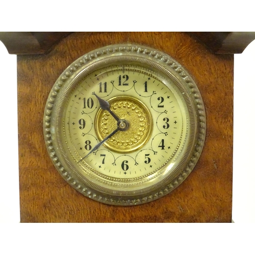 1396 - A mantle clock formed as a miniature long case / grandfather clock. Approx. 16 1/2